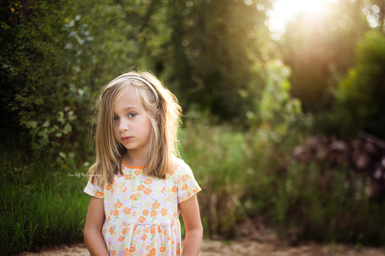 Girl in yellow dress outside with pretty back light. Midland, Michigan photographer