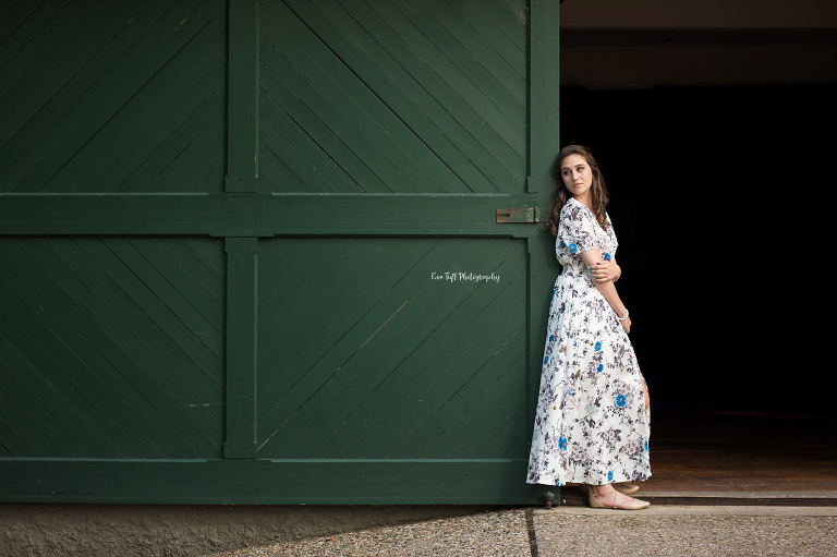 Senior girl standing by one of the barns at Dow Gardens | Midland Photographer