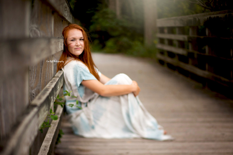 Red-Head senior girl wearing a 'Traveling' dress at Bay City State Park, Michigan | High School Photographer