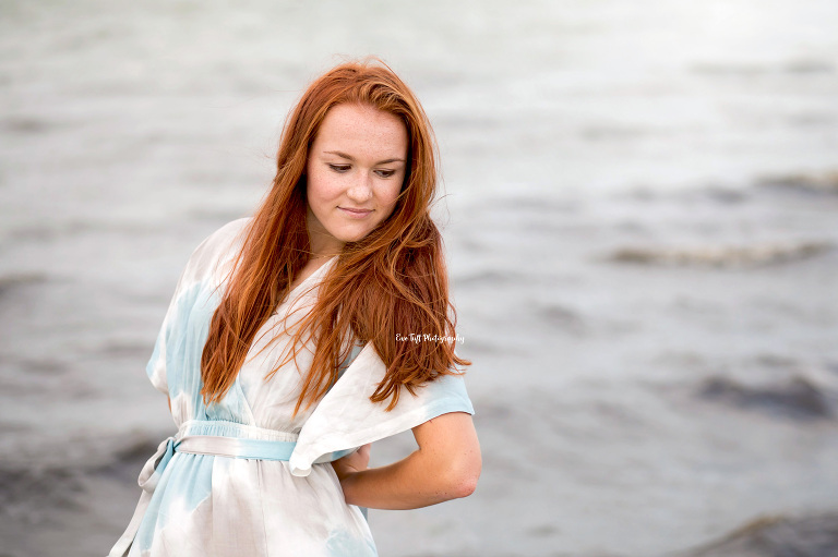 Teenage girl with long, red hair on the beach in Bay City, Michigan | Senior Portraits