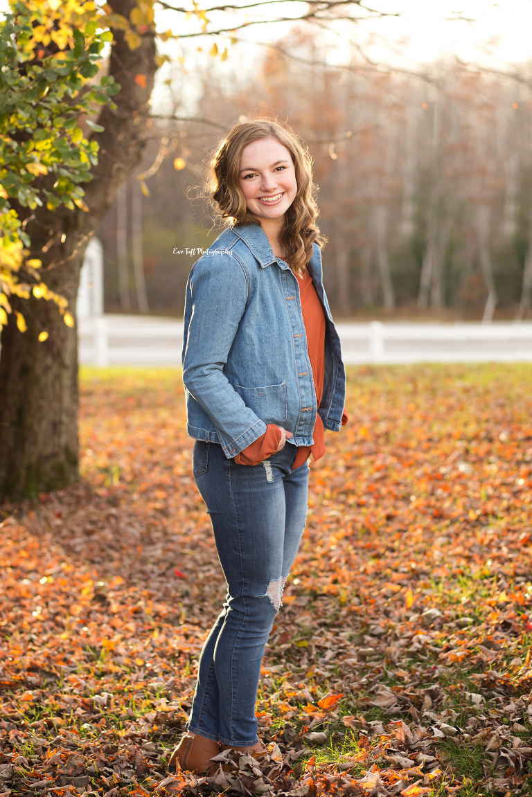 Standing girl posing with her hands in her pockets outside | Eve Tuft Photographer