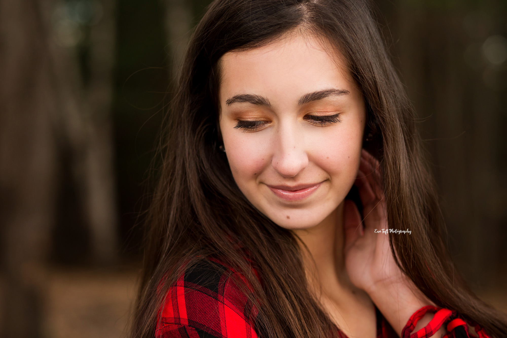 Senior Girl sweetly smiling while looking down | Midland, Michigan photographer