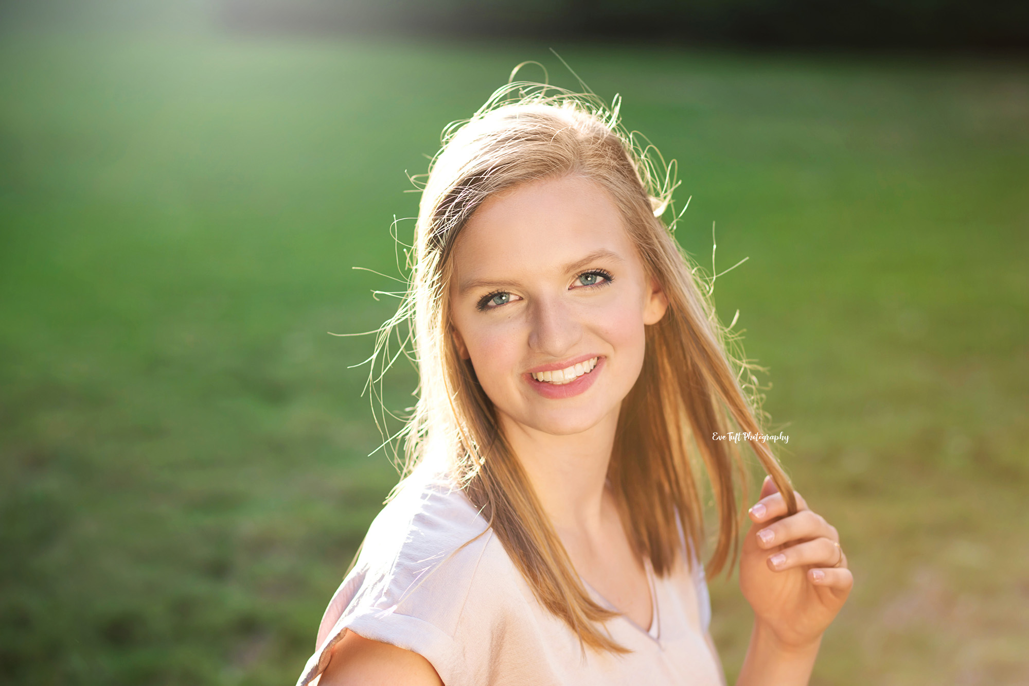 Senior girl posing for a head shot for her photography session | Michigan high school portraits with Eve Tuft in Midland