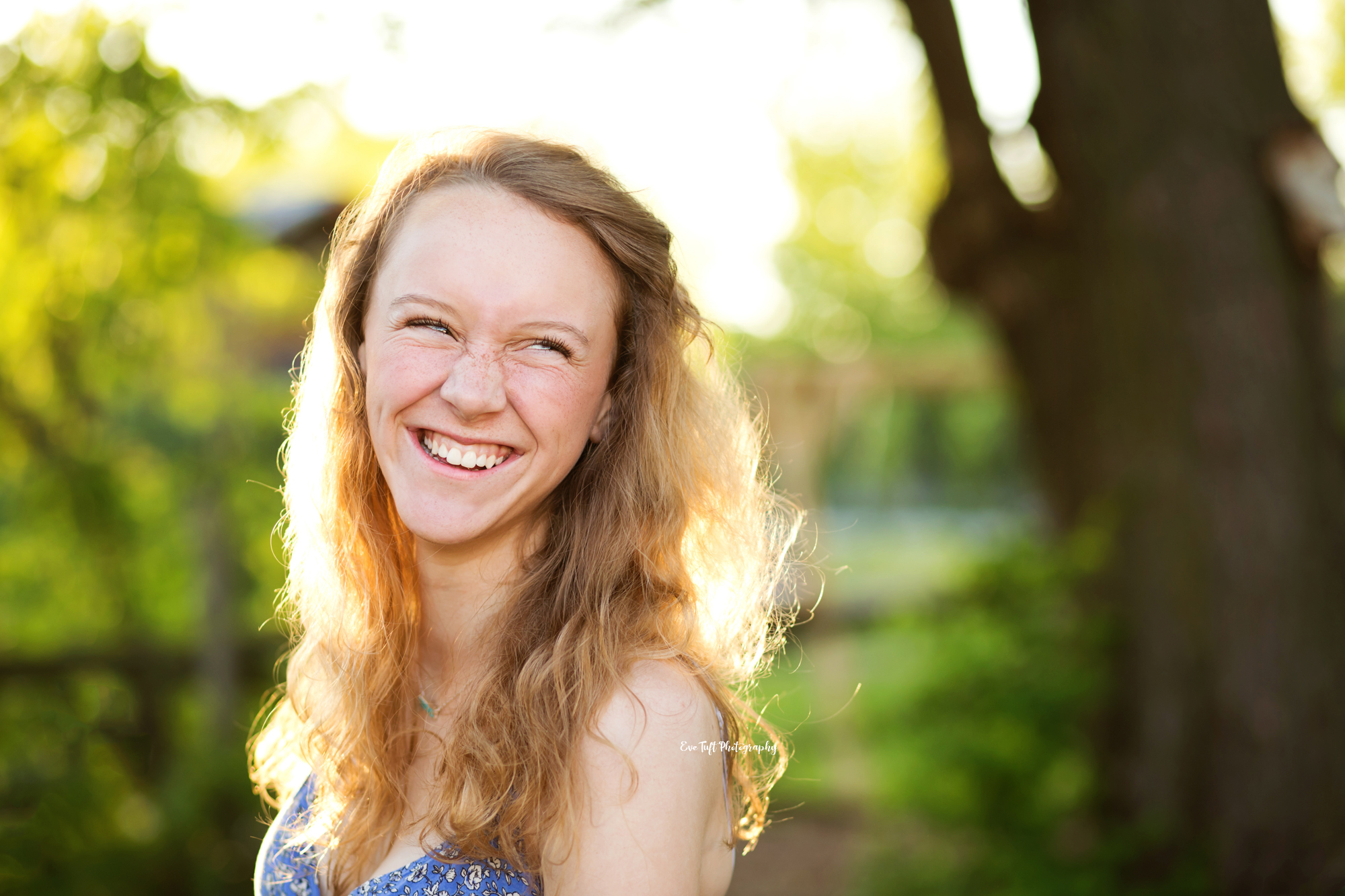 Beautiful senior girl laughing | Portrait Photographer in the Tri Cities in Michigan