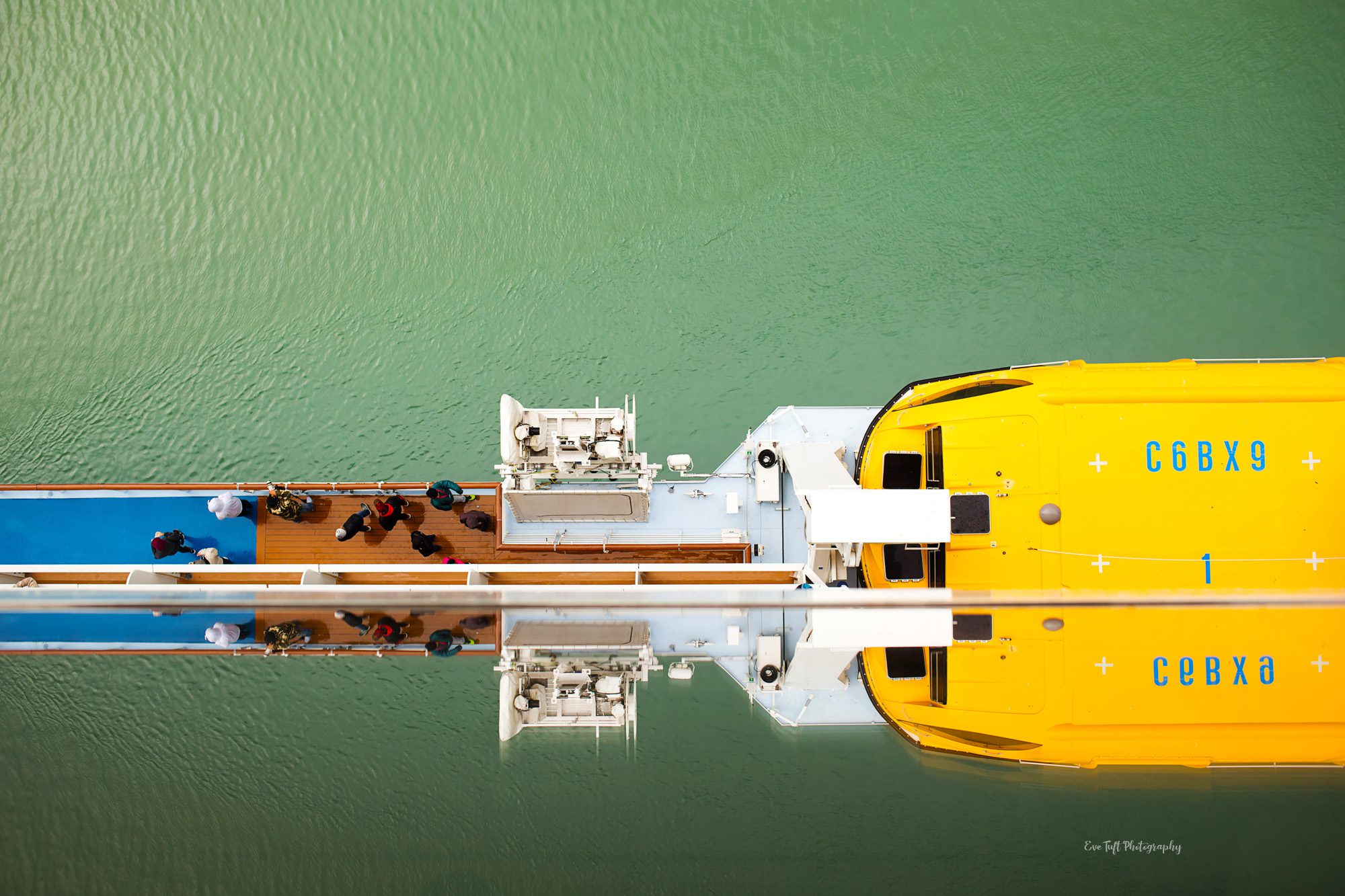 Cruise ship and lifeboat and reflection of the windows
