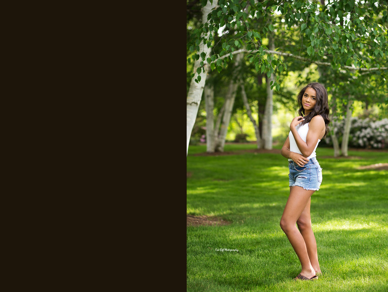 Senior girl standing  outside in Dow Gardens for her photo session | Michigan Senior Photographer