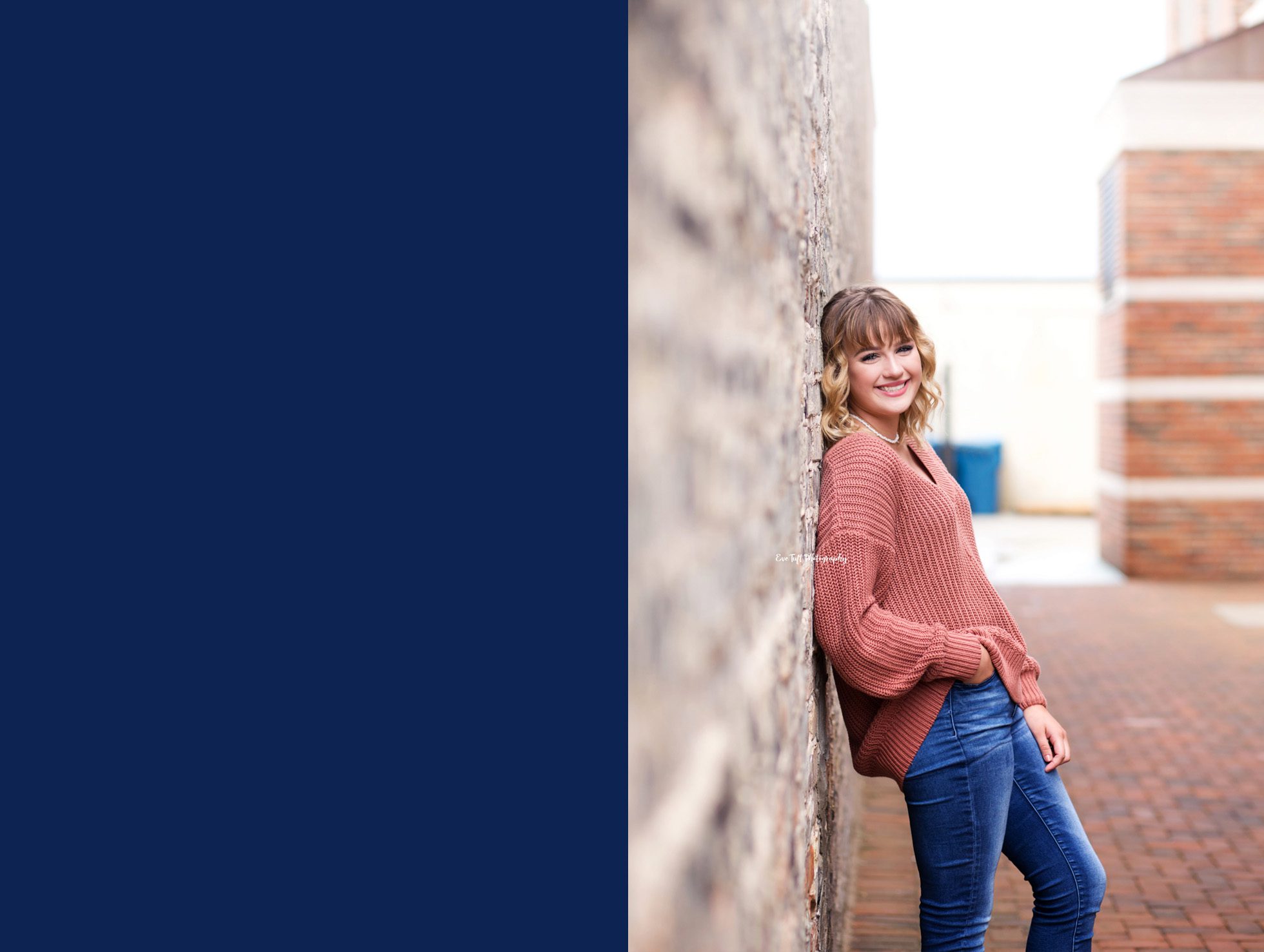 Senior girl standing in an alleyway with her hand in her pocket | Michigan Portrait Photographer