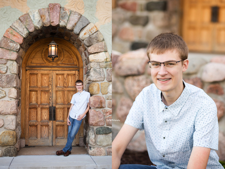 Senior guy poses in front of a courthouse with stone archways  at a location in Midland, Michigan | Senior Photographer