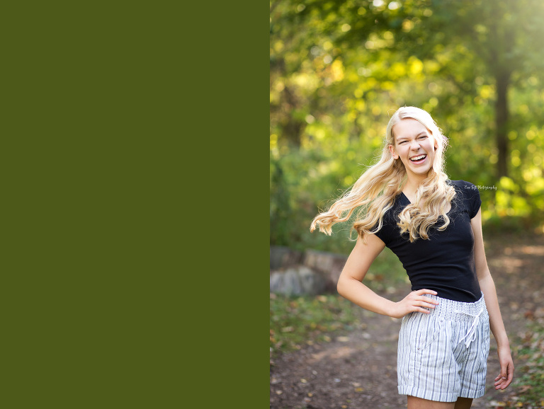 Senior girl flips her hair behind her shoulder as she laughs | A reschedule photo session in Midland, Michigan