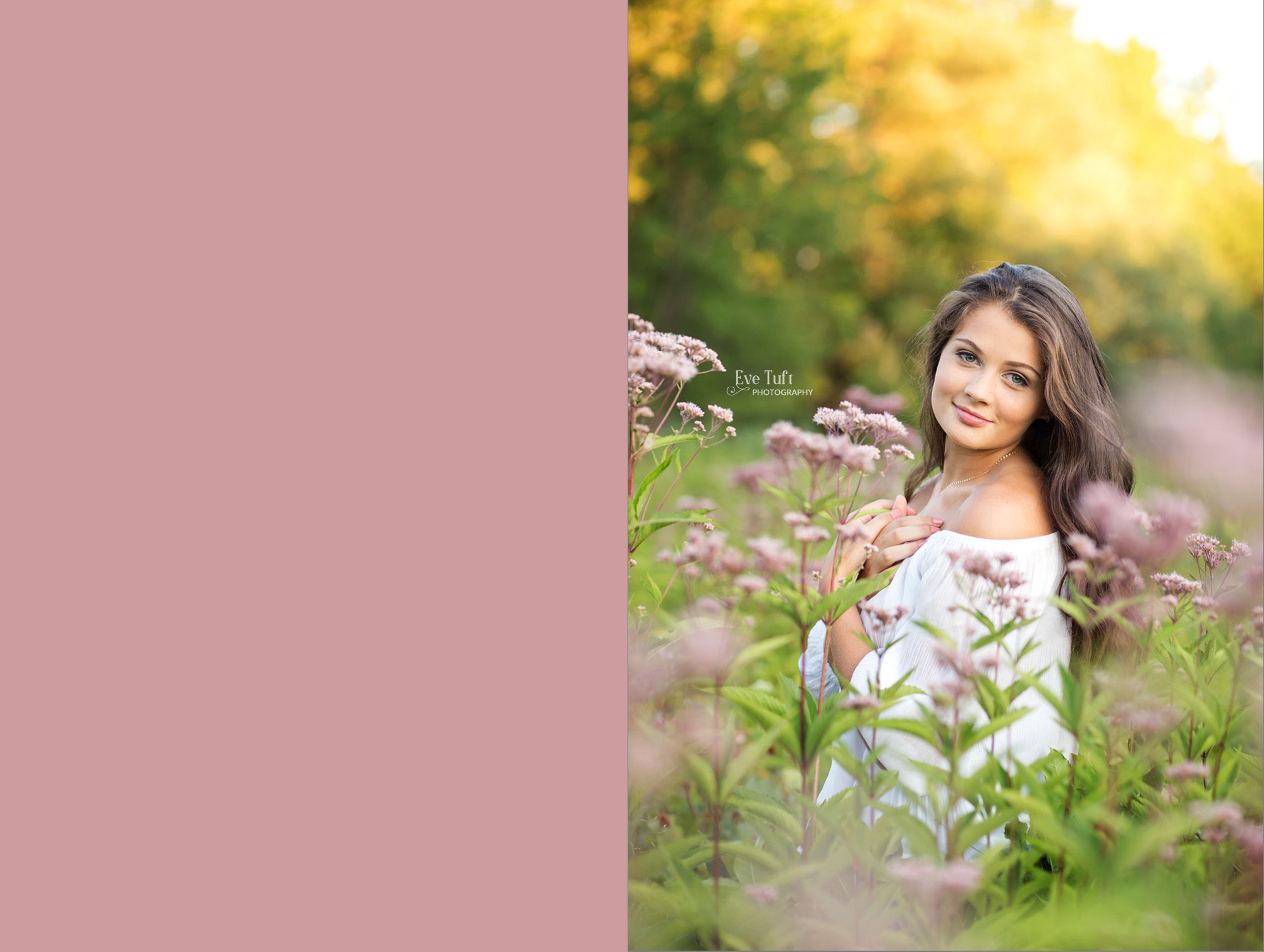 A senior girl stands in a field of purple wildflowers at the Chippewa Nature Center | Senior Portraits in Midland, Michigan