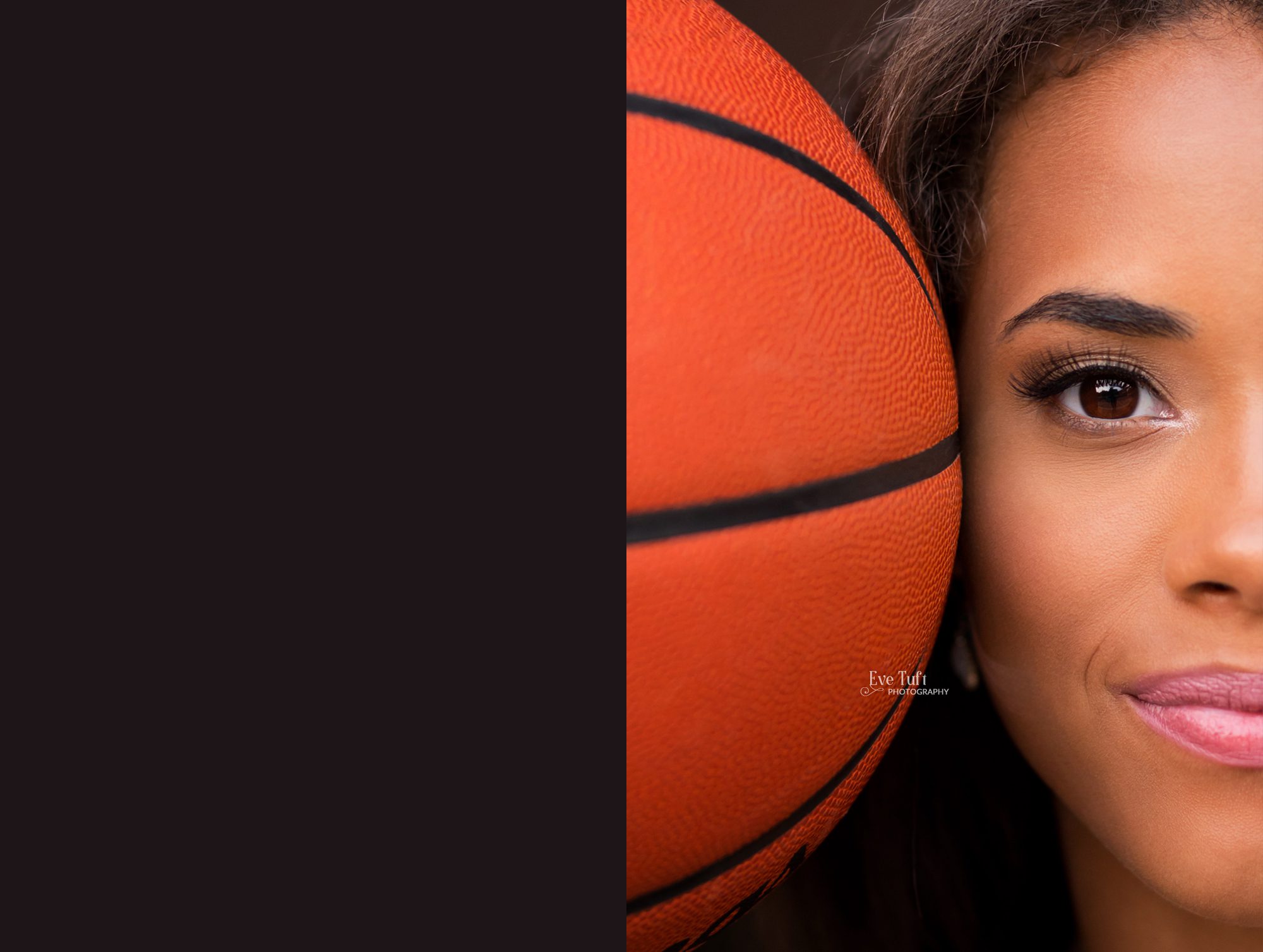 A close up shot of a senior girl with her basketball in Downtown Midland, Michigan | Senior Portraits