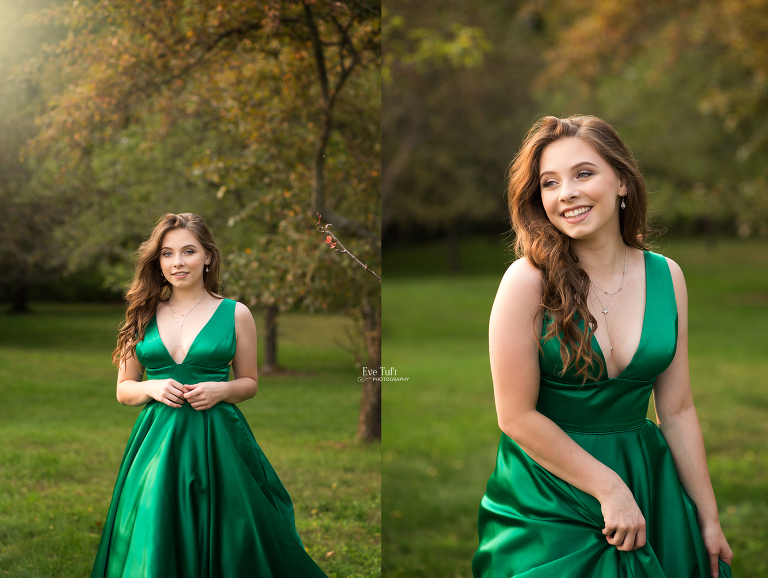 A lovely senior girl stands on the grass while wearing a green prom dress | Senior Photo shoot in Midland, Michigan