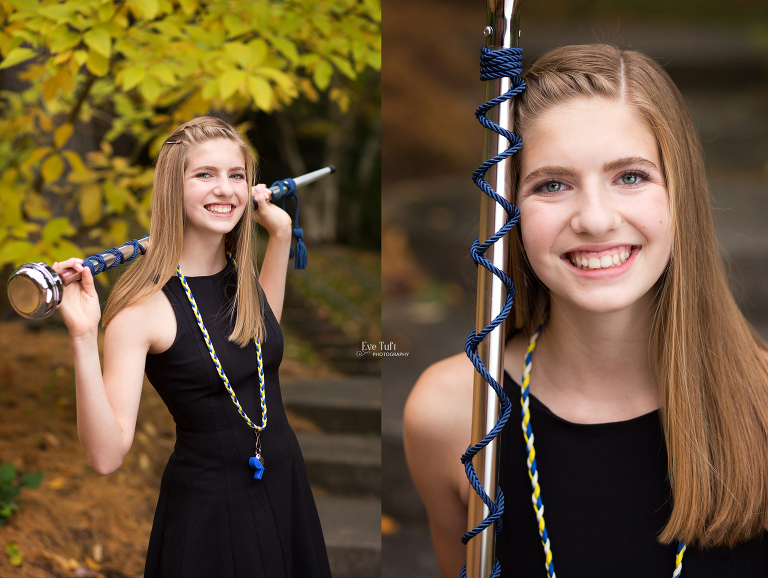 A Drum Major takes pictures with her whistle and mace for senior session outside | Michigan senior photographers