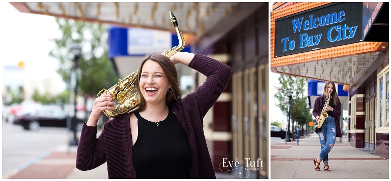 A happy senior laughs with her saxophone outside the theater in downtown Bay City in Michigan