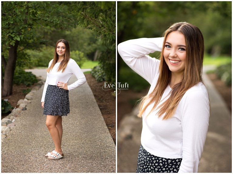 A lovely woman stands on a path in a garden | Dow Gardens High School Senior Photography in Midland, MI