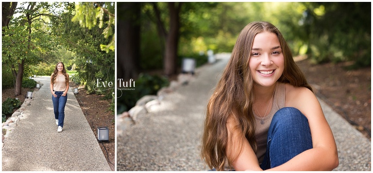 A beautiful teen walks to the camera on a pathway at Dow Gardens | Senior Photoraphers in Midland, MI