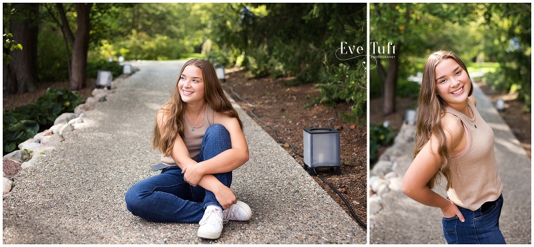A high school senior sits on a pathway at Dow Gardens | Senior photographer in Midland, Michigan