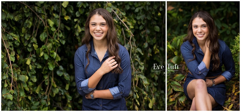 A beautiful teenager stands in front of a wall of vines at Dow Gardens | Senior Photographer in Midland, MI