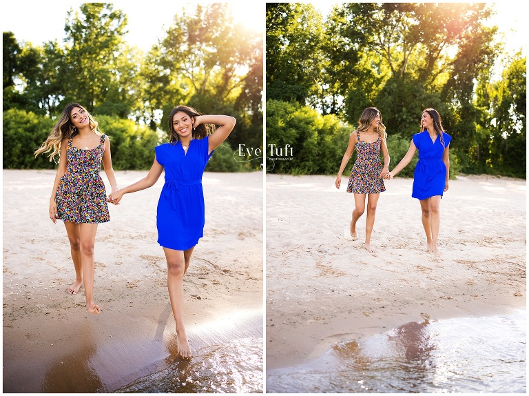 Two beautiful cousins hold hands along the beach in the water | Senior Photographers in Midland, MI