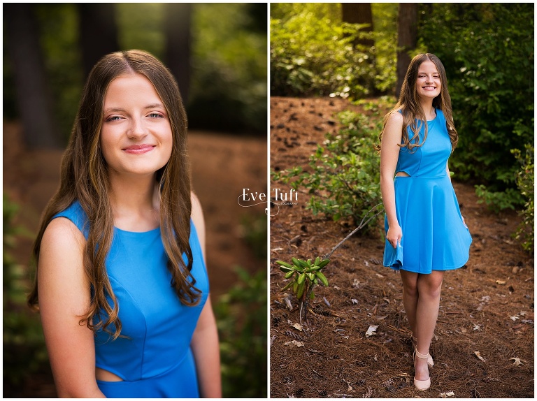 Kate stands in a forest in Michigan in a blue dress for her session | Senior Photographers in Midland