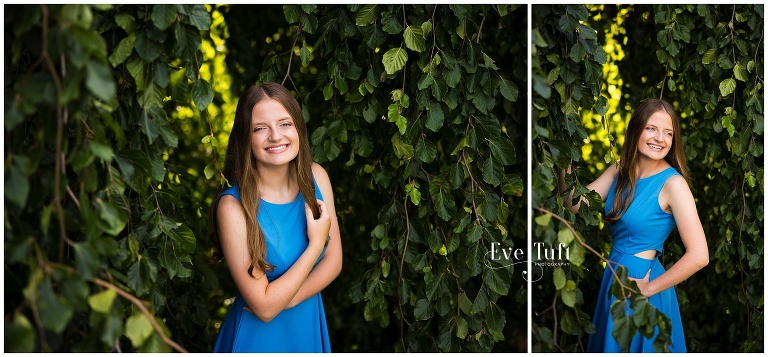 A beautiful teen stands surrounded by vines outside | Dow Gardens Senior Photographer